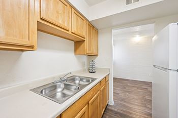 Kitchen with wooden cabinets